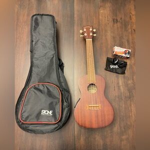 Makala Soprano Ukulele with Case
& Tuner